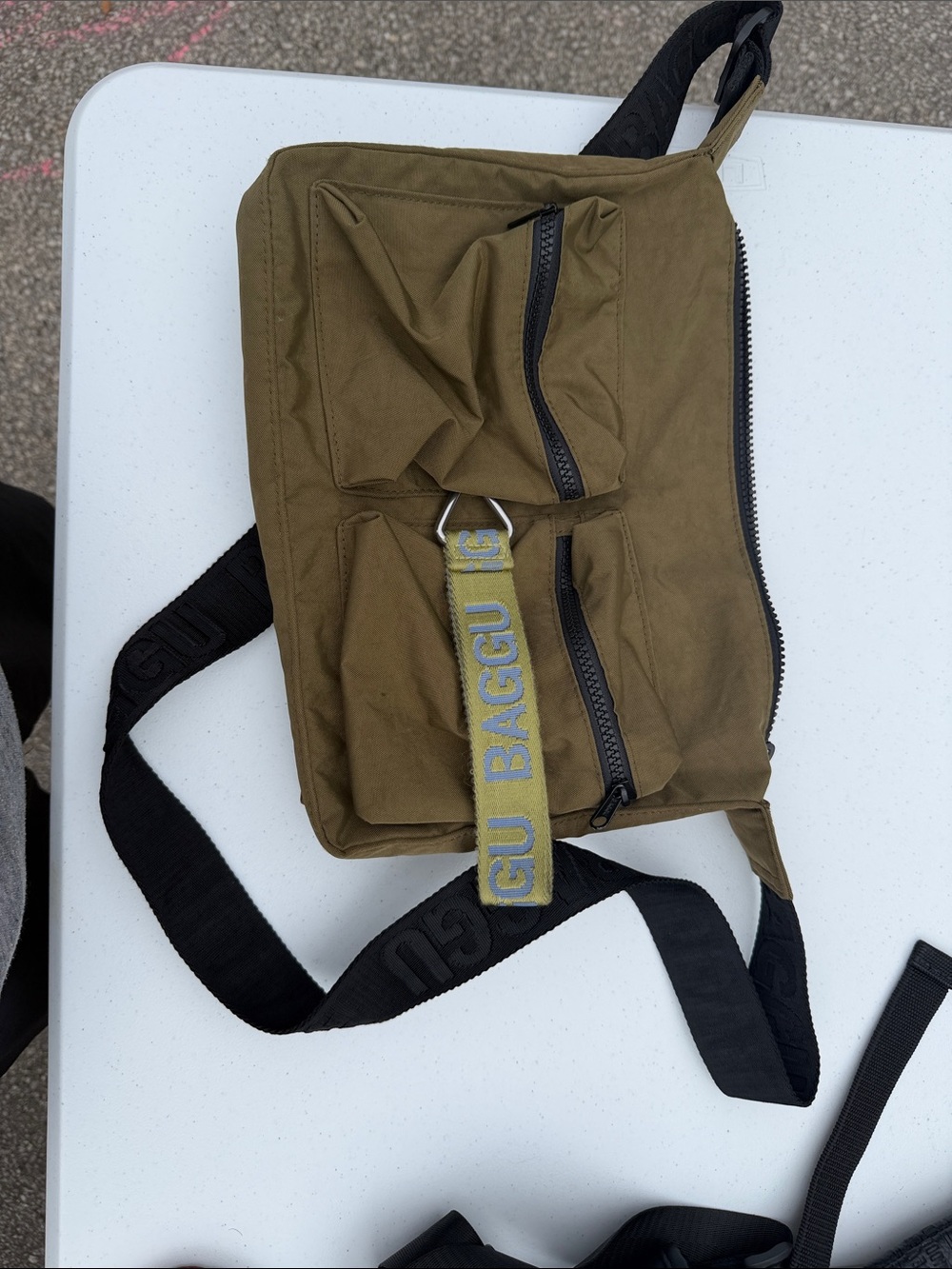BAGGU Olive Green Canvas Belt Bag with Black Strap.  Discontinued color.